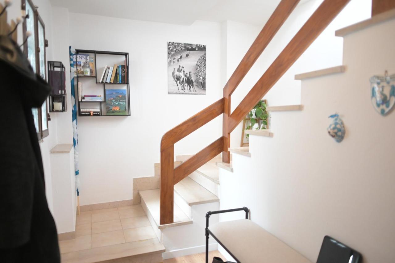 Un Terrazzo Sulla Magia Apartment Siena Bagian luar foto