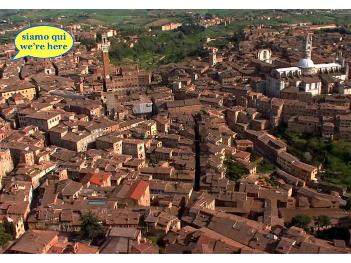 Un Terrazzo Sulla Magia Apartment Siena Bagian luar foto