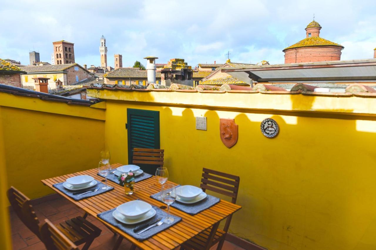 Un Terrazzo Sulla Magia Apartment Siena Bagian luar foto